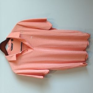Travis Mathew Coral Polo Shirt